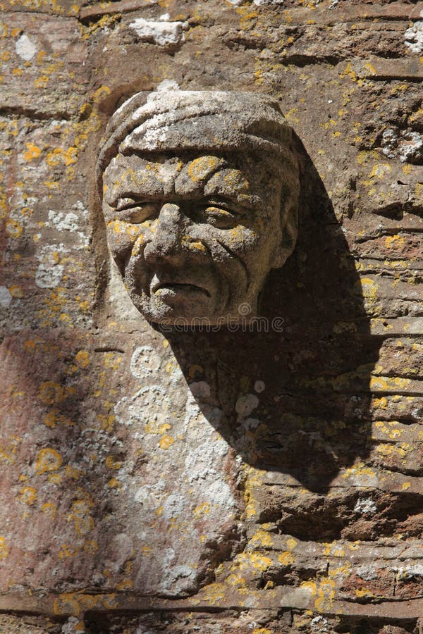 Carved Stone Figure Head stock image. Image of religious 38511475