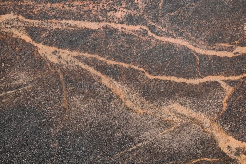 Stone floor old brown tile with abstract pattern wall texture background royalty free stock photo