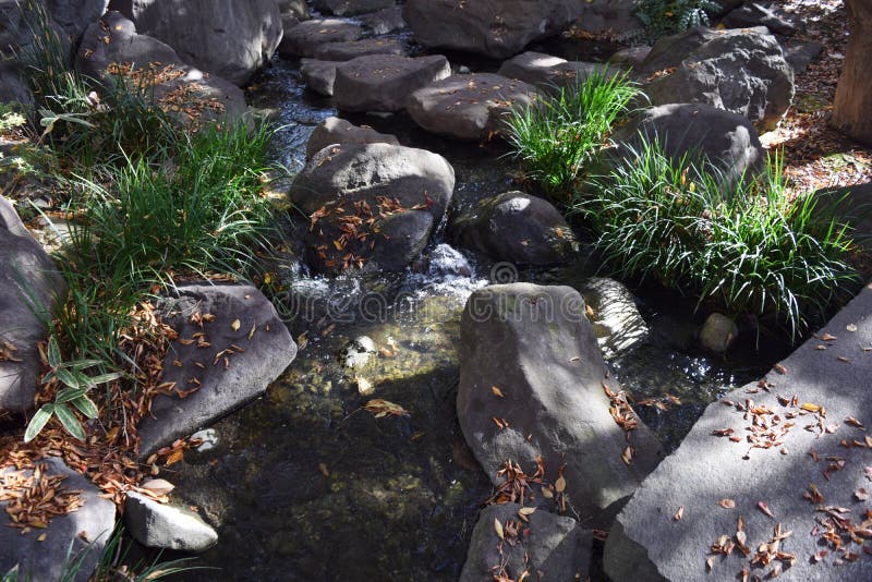 Stone and Flowing Water of Japanese Garden Stock Image - Image of creek ...