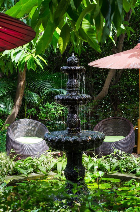 Stone fountain in the garden