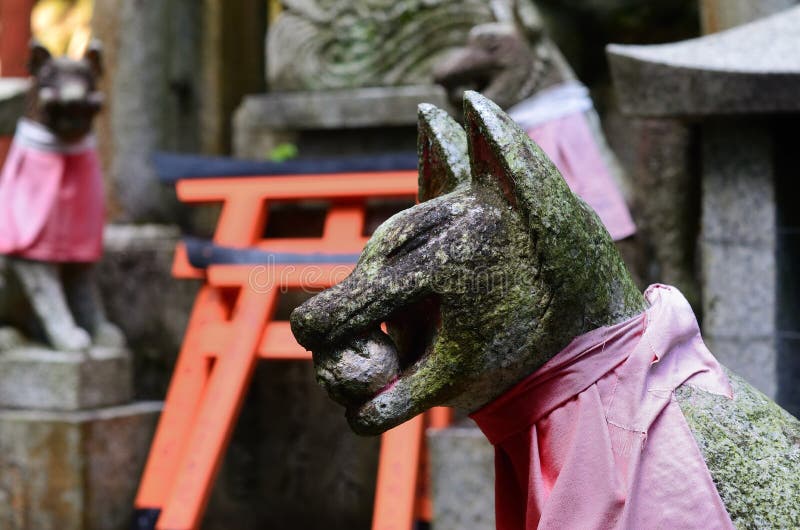 Stone fox at Fushimi Inari shrine,Kyoto Japan