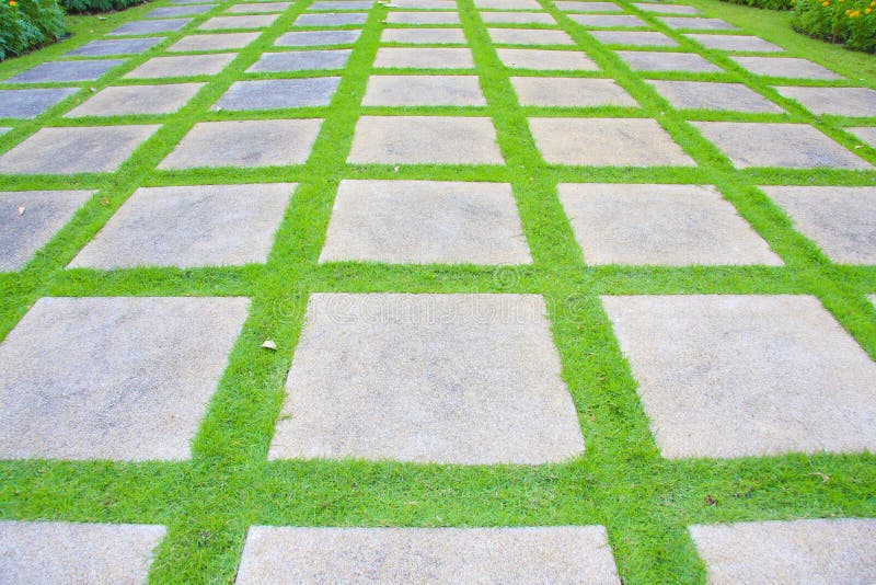 Stone on grass stock photo. Image of garden, background 24906622
