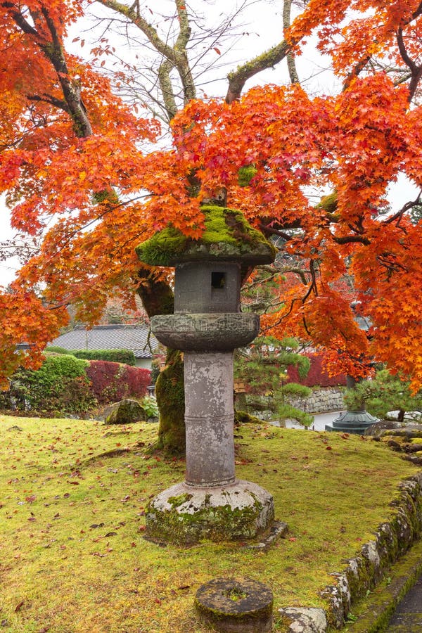 Stone lantern (toro) in autumn, Nikko, Japan royalty free stock images