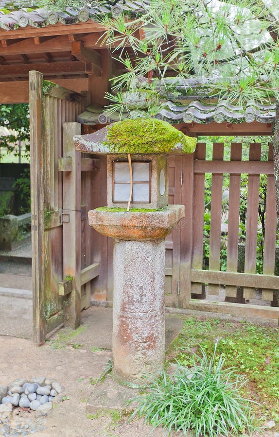 Stone lantern (toro) in Ujigami Shinto Shrine in Uji, Japan stock photos Stone lantern (toro) in Ujigami Shinto Shrine in Uji, Japan stock photos