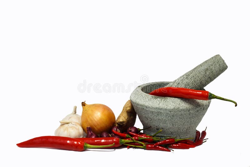 Stone mortar with fresh flavoring herbs and spices. stock photo