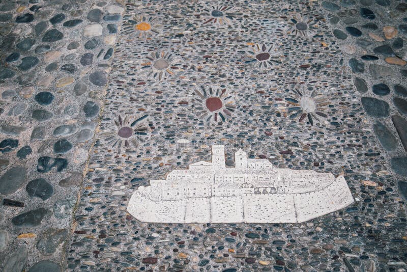 Stone mosaic on floor illustrating old city St. Paul de Vence, France, Cote d`Azur royalty free stock image Stone mosaic on floor illustrating old city St. Paul de Vence, France, Cote d`Azur royalty free stock image
