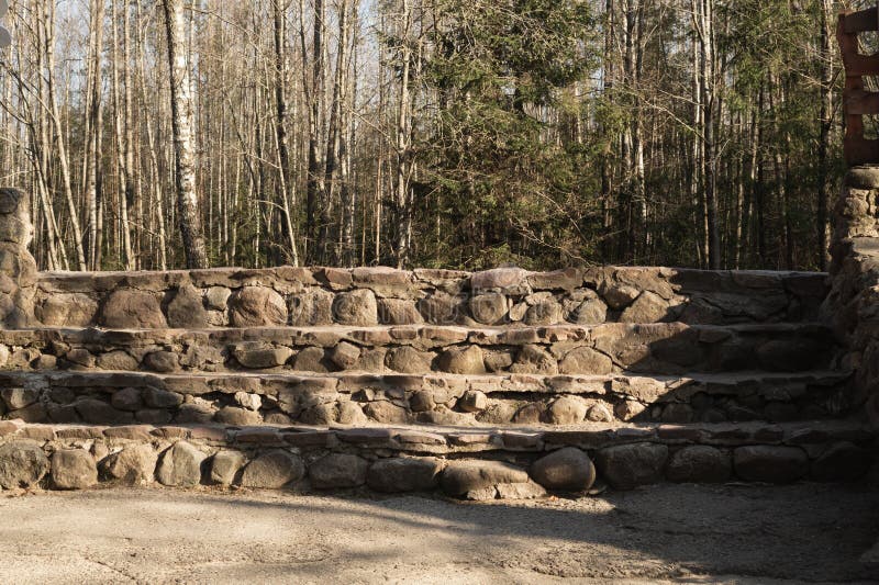Stone steps ladder. stairs from natural stones in the park stock photos Stone steps ladder. stairs from natural stones in the park stock photos