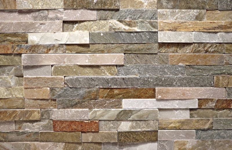Stone Wall Cladding Made Of Natural Strip Rocks. Colors Are Pink,white,brown,gray. Stock Photo - Image of pattern, exterior: 160627396