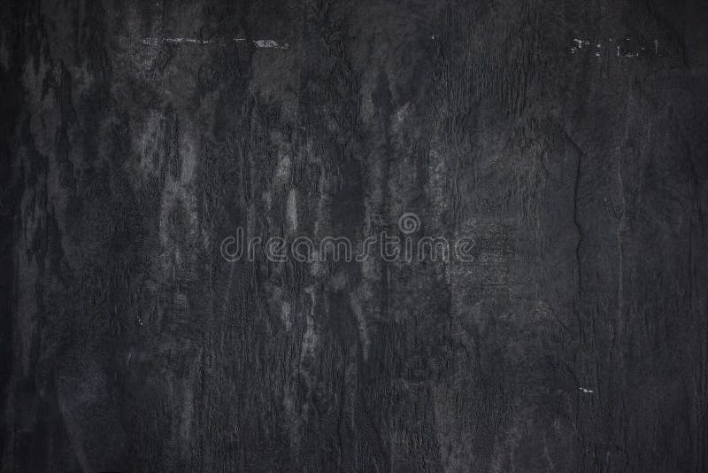 The stone wall concrete textured black background