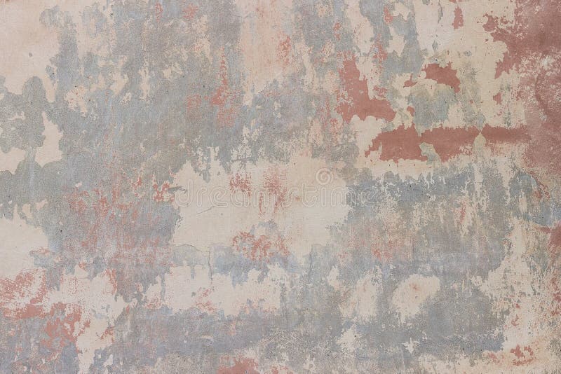 Stone wall with cracked, peeling plaster and paint as texture, background royalty free stock photos Stone wall with cracked, peeling plaster and paint as texture, background royalty free stock photos