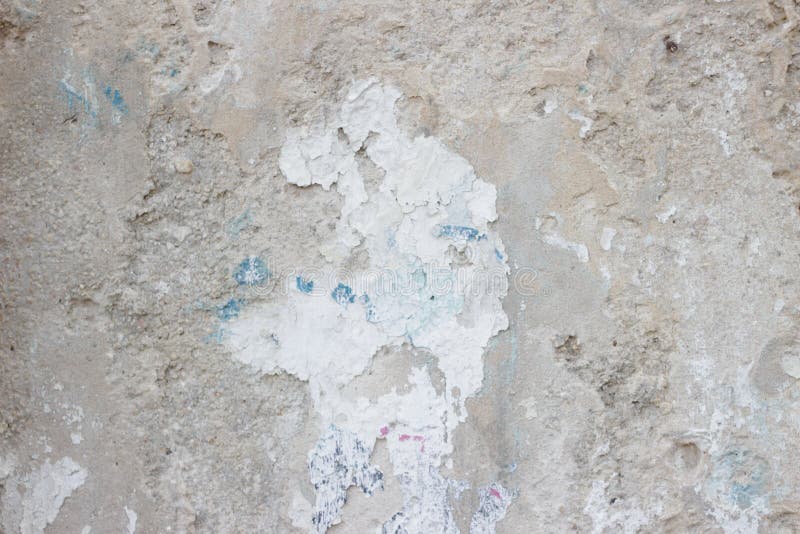 Stone Wall with a Multilayered Old Tumbling Whitewash Texture Stock