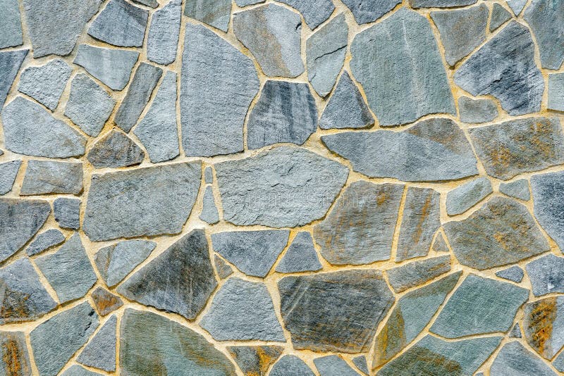 Stone wall. Wall of stones as a texture. Wall of stones. wall of a medieval fortress with mainly white or light colored stock image