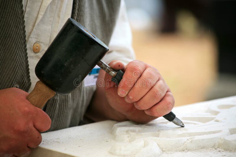 Stonemason at work stock photos