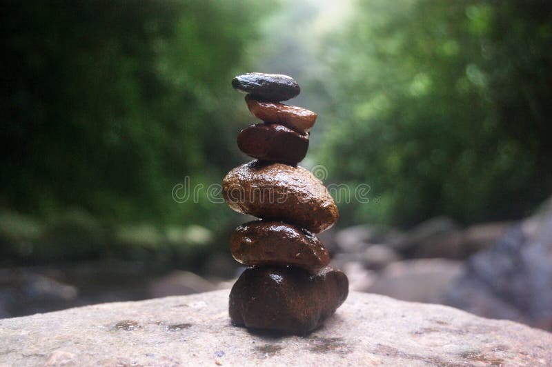 Stones balance and wellness spa concept in waterfall forest stock photos Stones balance and wellness spa concept in waterfall forest stock photos