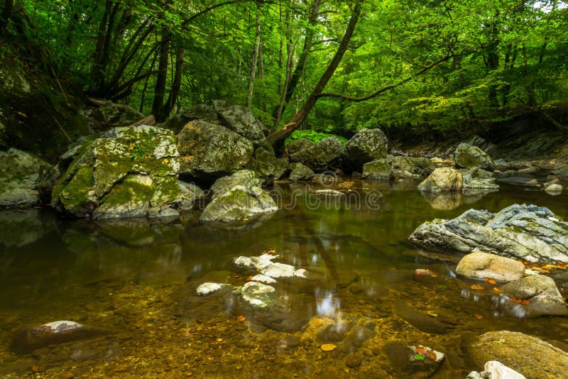 Stones by The River