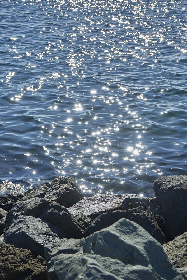 Sun Sparkles Dancing on Blue Water Stock Image - Image of ocean, grey ...