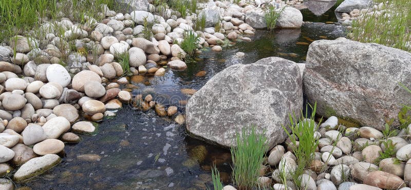 Stones running river stock images.