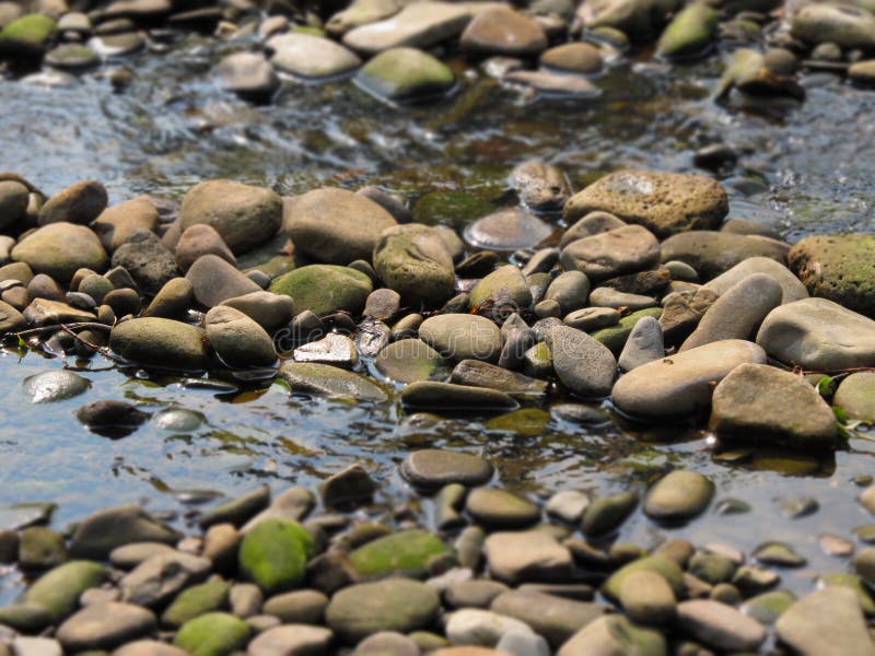 Stones and water stock photo. Image of linear, flowing 49179016