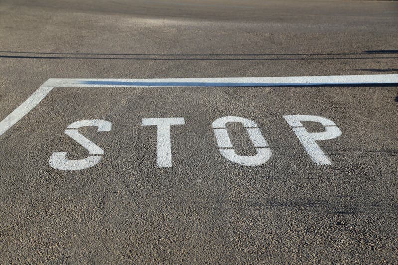 Stop - Road Marking on the Asphalt at the Intersection Stock Image - Image of safety, crosswalk: 152961821