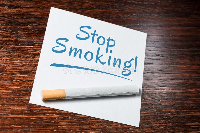 Stop Smoking Reminder with Cigarette on Wooden Shelf Stock Image