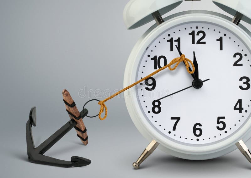 Stop time concept , clock hand stop by anchor