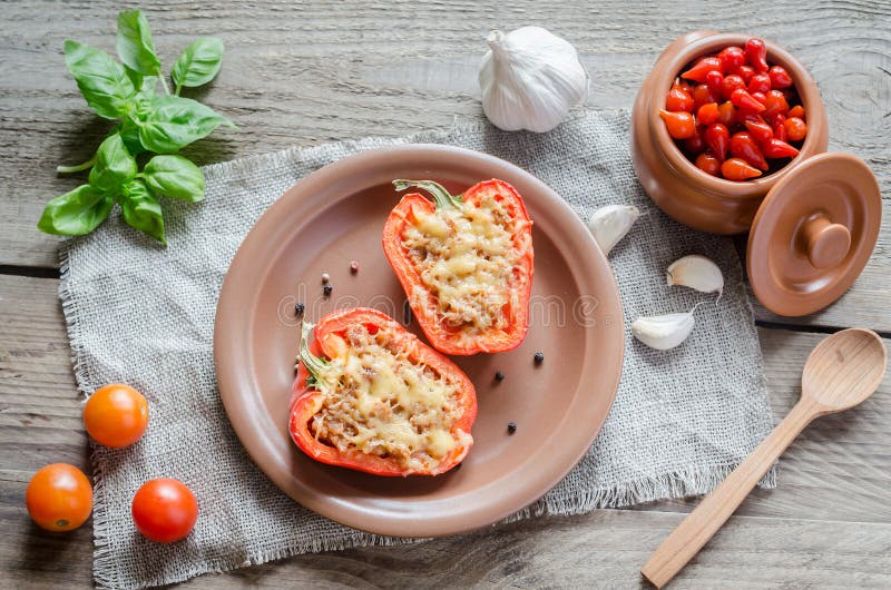 Stuffed peppers with meat in rustic decor. Stuffed peppers with meat in rustic decor