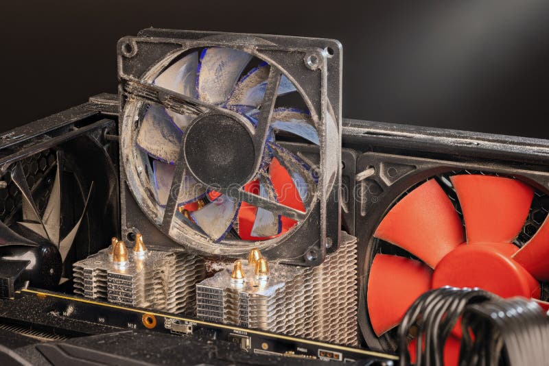 Stopped 90 mm pc fan close-up with thick layer of dust royalty free stock image