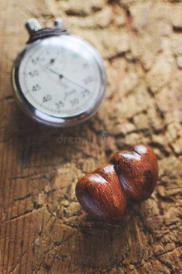 Stopwatch and Wooden Hearts Stock Photo Image of blackboard, board 48167338
