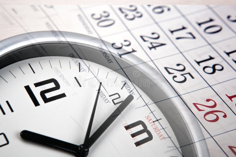 Large white clock face with calendar sheets closeup. Large white clock face with calendar sheets closeup