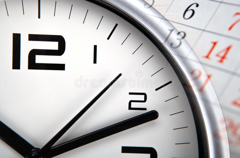 Large white clock face with calendar sheets closeup. Large white clock face with calendar sheets closeup