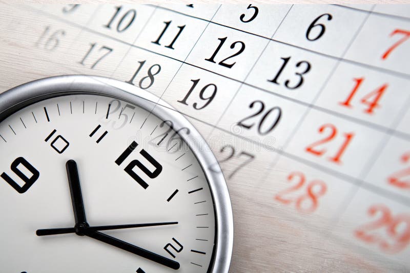 Large white clock face with calendar sheets closeup. Large white clock face with calendar sheets closeup