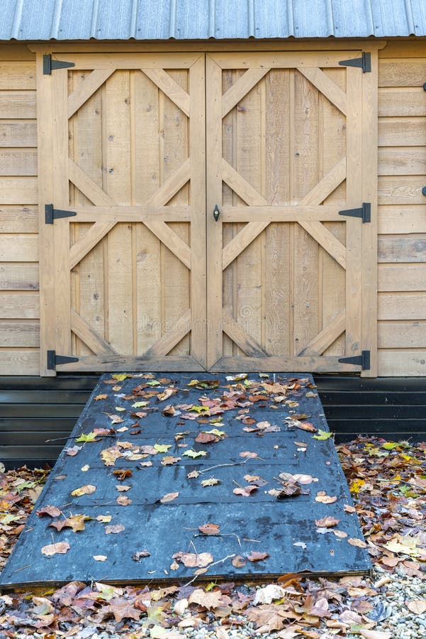 Storage Building Doors and Ramp Stock Photo Image of tool, barn