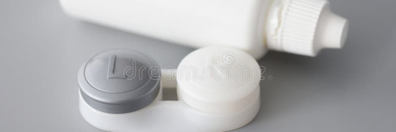 Storage Container for Soft Contact Lenses and Solution Bottle on Table