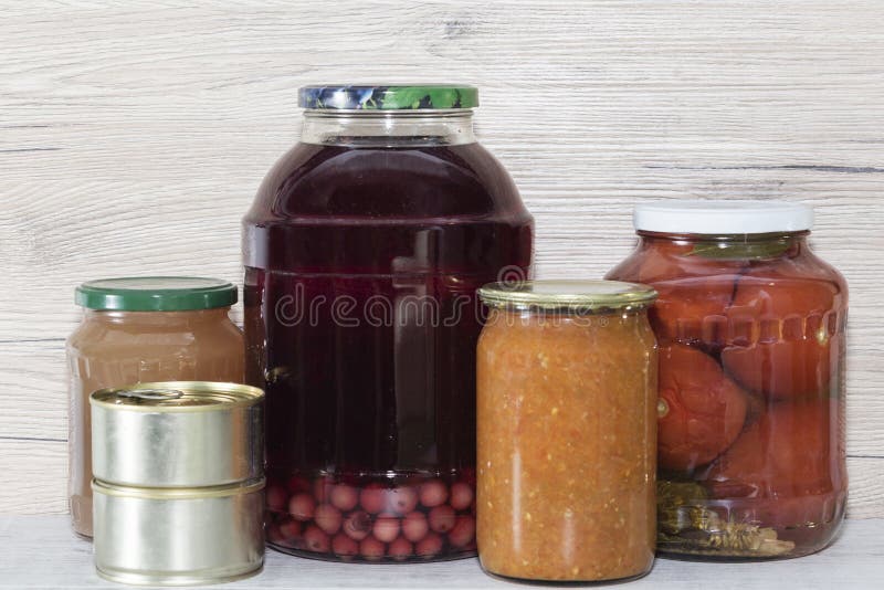 Storage Shelves in Pantry with Homemade Canned Preserved Fruits and