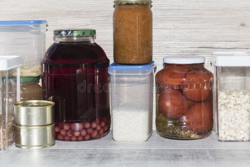 Storage Shelves in Pantry with Homemade Canned Preserved Fruits and