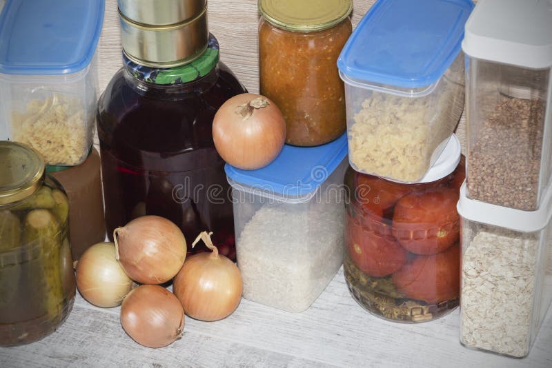 Storage Shelves in Pantry with Homemade Canned Preserved Fruits and