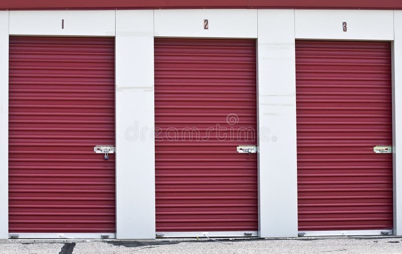 Burgundy colored doors on three locked storage areas. Burgundy colored doors on three locked storage areas