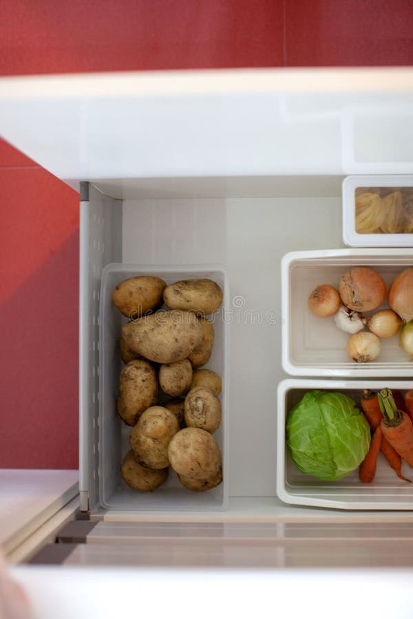 Storing Vegetables in the Kitchen. Stock Photo Image of kondo, space