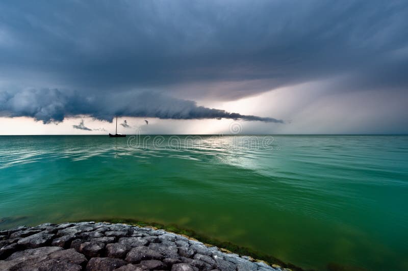 A storm cloud approaching on the IJsselmeer