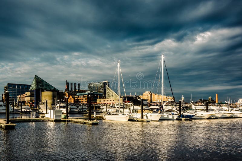 Storm clouds over a marina at the Inner Harbor, Baltimore, Maryland. stock photos Storm clouds over a marina at the Inner Harbor, Baltimore, Maryland. stock photos