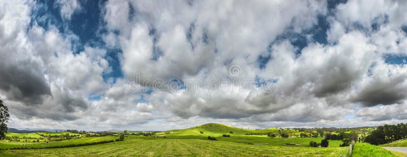 Storm Clouds Over Rolling Hills Landscape Stock Photo Image Of Land