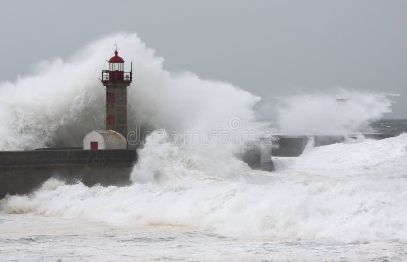Storm waves over the Lighthouse stock photo