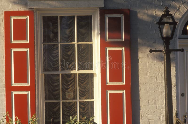 Storm windows on historic Georgetown shop, Washington D. C. stock photos