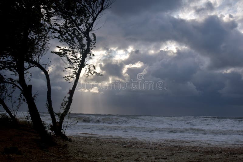 Storms at Sea and Wind, through Clouds Tries To Escape the Ray of Sun ...