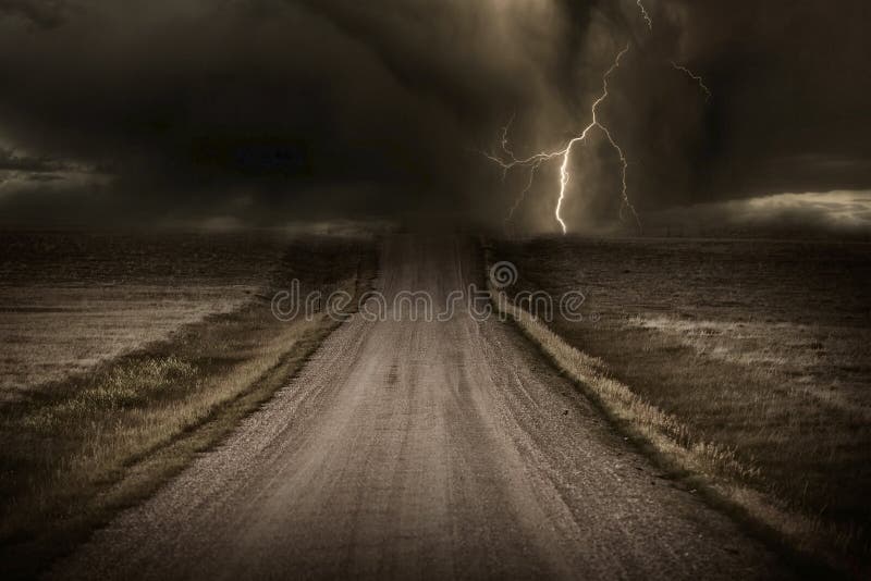 Stormy Back Country Road. Heavy Storm and Lightning Bolt in a Distans. Severe Weather Imagery Collection. Stormy Back Country Road. Heavy Storm and Lightning Bolt in a Distans. Severe Weather Imagery Collection.