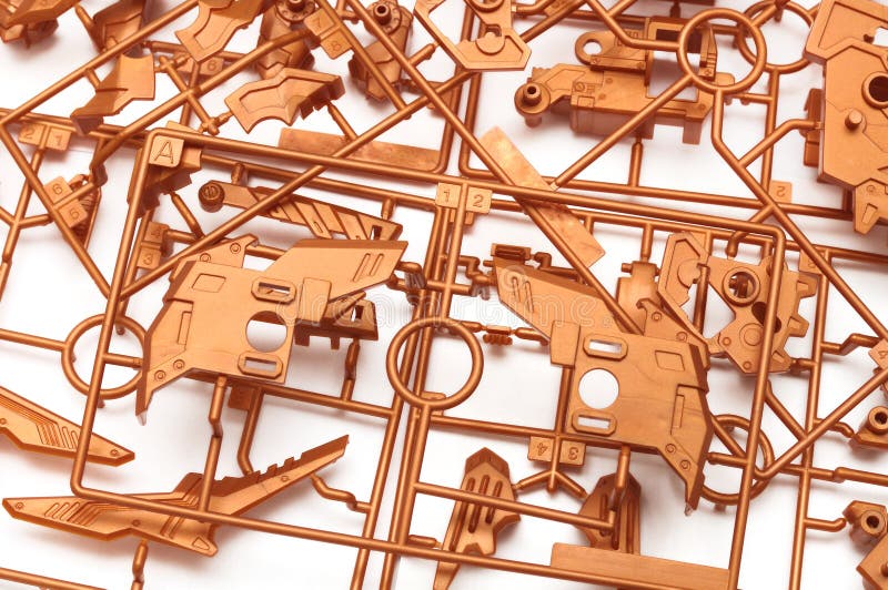 Stos kruszcowy pomarańczowy plastikowy szalkowego modela zestaw ustawiający z futurystycznymi mechanicznymi częściami obrazy royalty free Stos kruszcowy pomarańczowy plastikowy szalkowego modela zestaw ustawiający z futurystycznymi mechanicznymi częściami obrazy royalty free