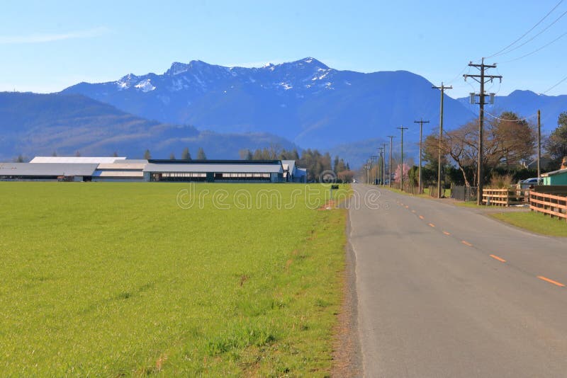 Canadian Country Road in Picturesque Valley royalty free stock photos Canadian Country Road in Picturesque Valley royalty free stock photos
