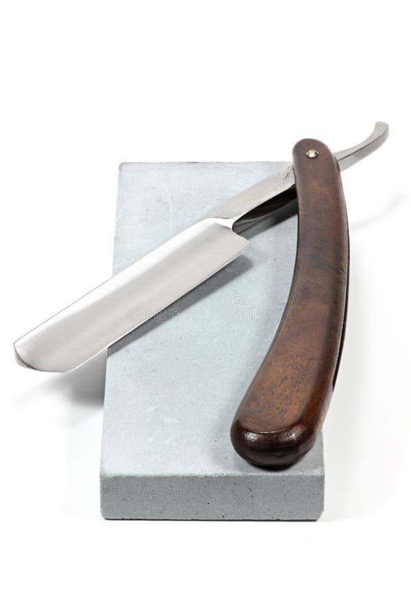 Premium Photo  Straight razor. vintage tools for barbers, razor, sharpen  the blade in leather brush, razor blades. man stropping straight razor with  leather tool.