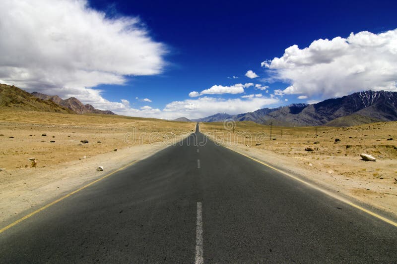 A very straight road in Mountains,NH1 from Srinagar to Leh, Ladakh, Jammu & Kashmir, India. A very straight road in Mountains,NH1 from Srinagar to Leh, Ladakh, Jammu & Kashmir, India