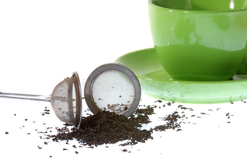 Strainer with a tea cup